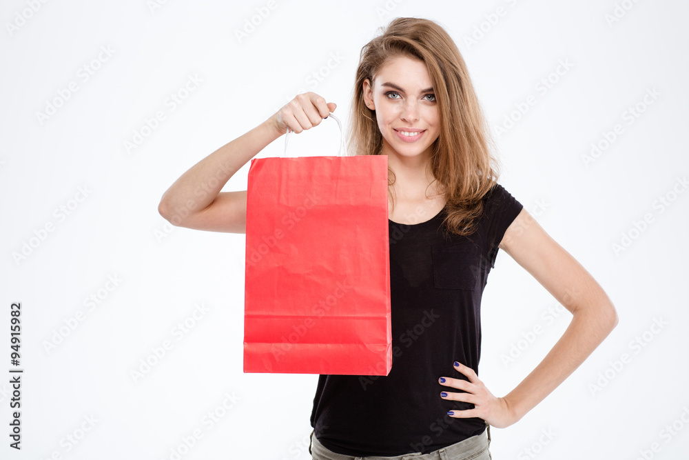 Smiling woman holding shopping bag Smiling woman holding shopping bag