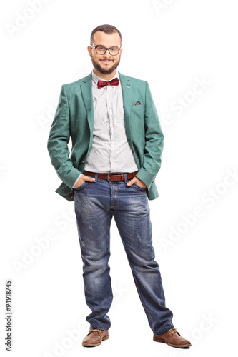 Young man posing in a green coat