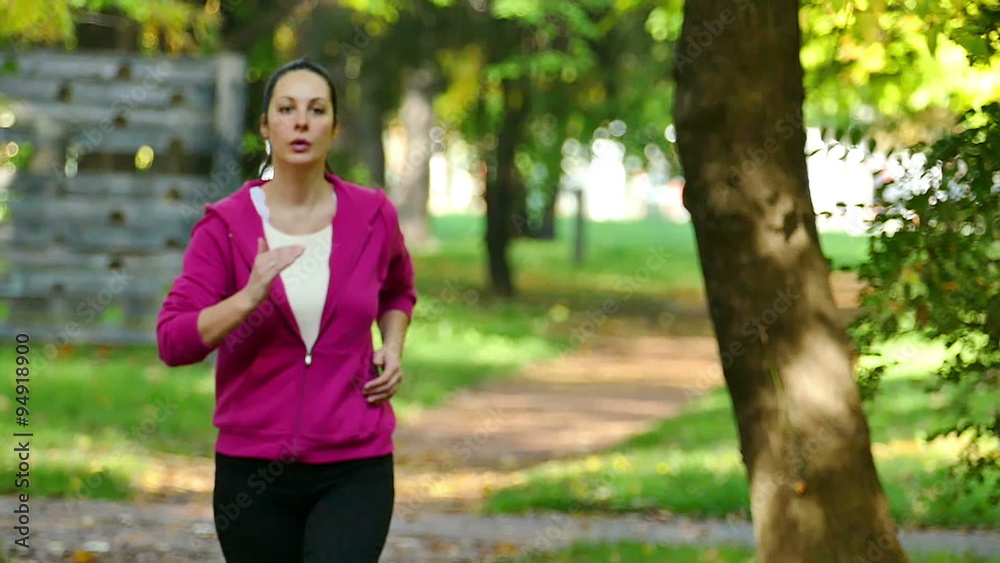 A young woman runs in a beautiful green park in slow motion, The Slow Motion Of Running In A Nature, Slow Motion Video Clip A young woman runs in a beautiful green park in slow motion, The Slow Motion Of Running In A Nature, Slow Motion Video Clip