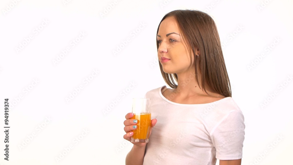 Beautiful, sporty woman drinking juice, on white Beautiful, sporty woman drinking juice, on white