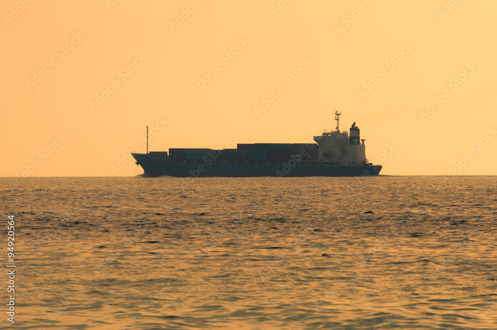 commercial cargo ship carrying containers