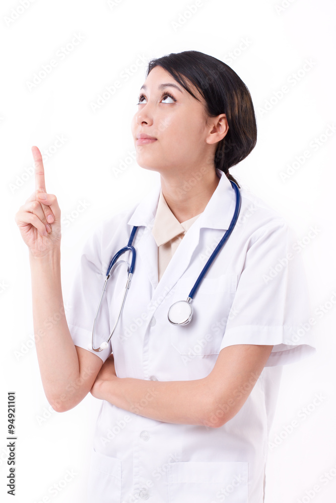 smart female doctor pointing up to blank space smart female doctor pointing up to blank space