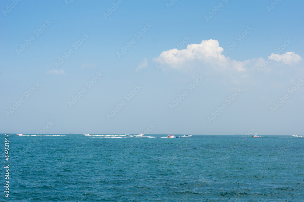 Blue sunny sea and soft sky