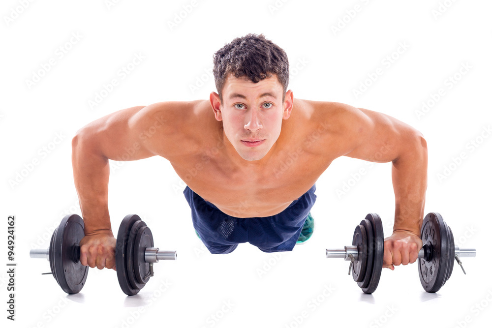 Muscular bodybuilder guy doing exercises