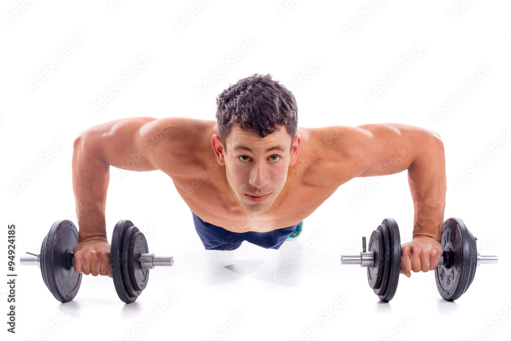 Muscular bodybuilder guy doing exercises Muscular bodybuilder guy doing exercises