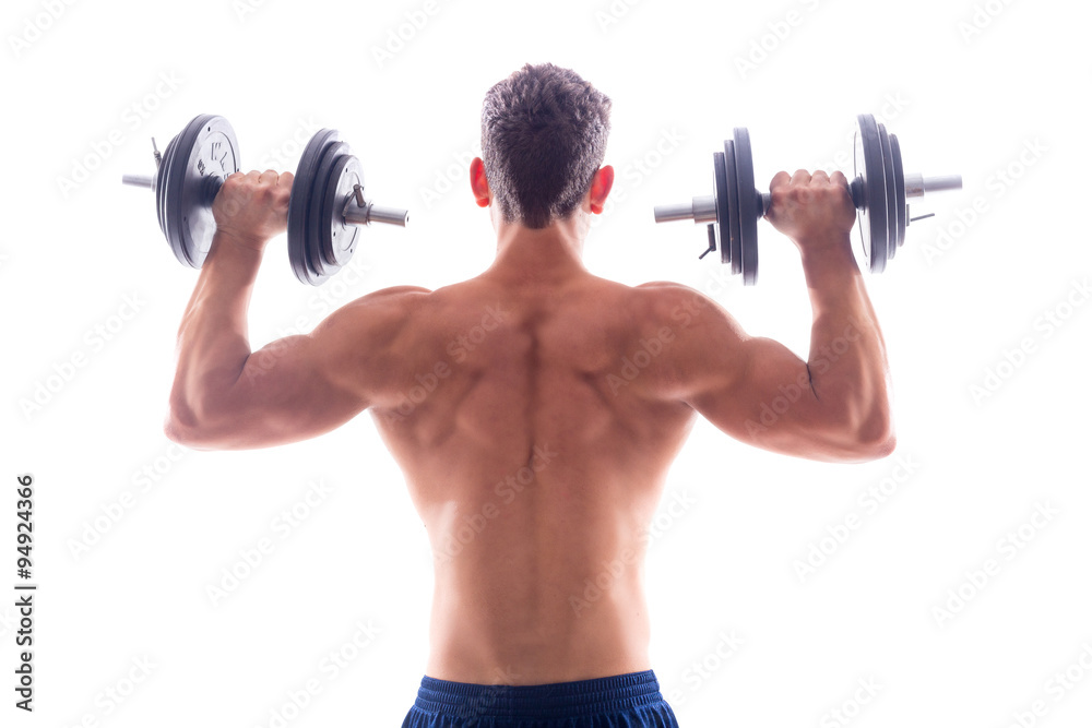 Muscular bodybuilder guy doing exercises Muscular bodybuilder guy doing exercises