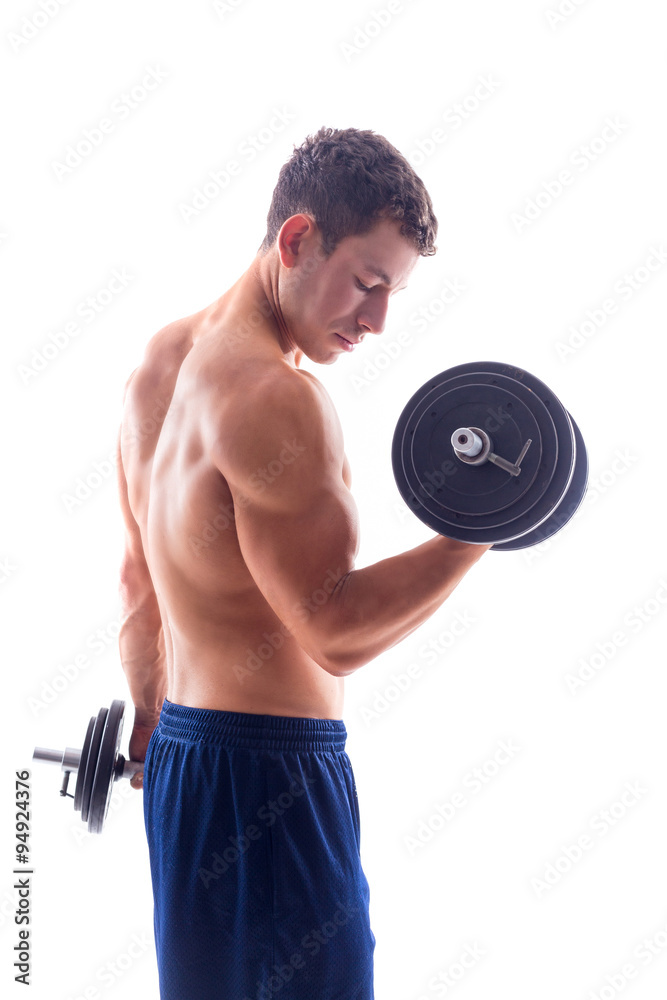 Muscular bodybuilder guy doing exercises Muscular bodybuilder guy doing exercises