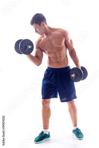 Muscular bodybuilder guy doing exercises