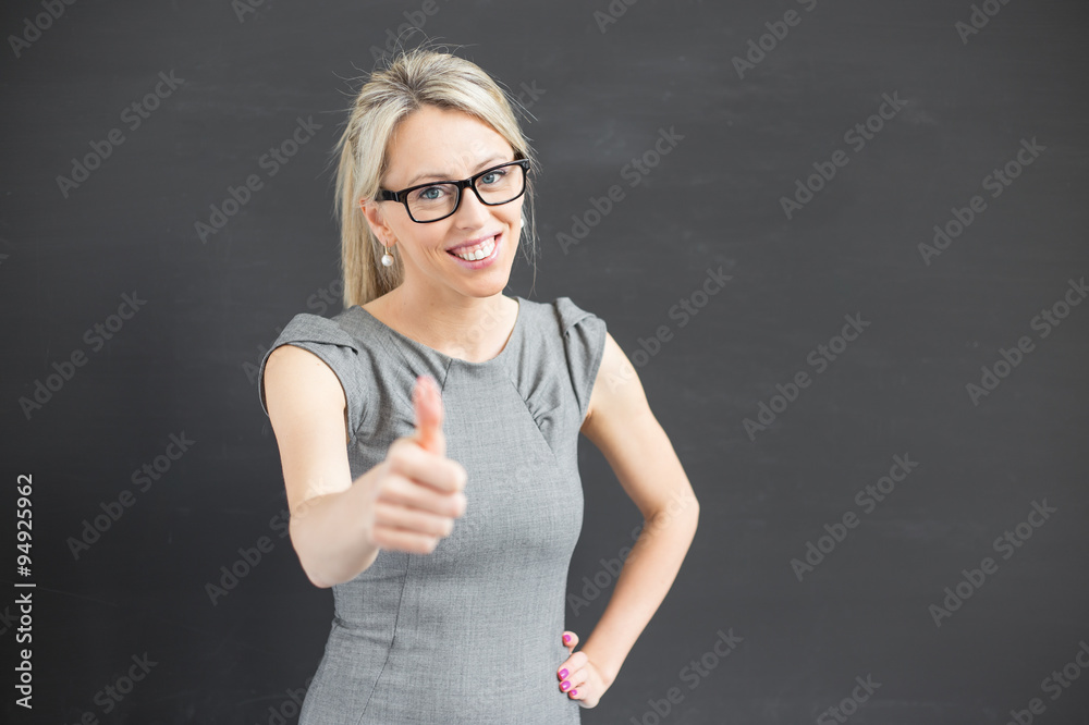 Teacher showing thumb up