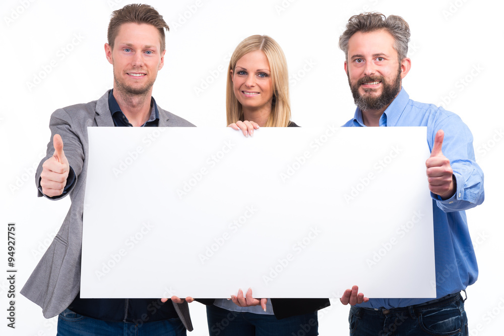 erfolgreiches team zeigt werbetafel erfolgreiches team zeigt werbetafel