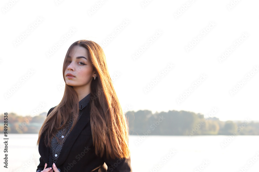 beautiful young girl on the background of nature beautiful young girl on the background of nature