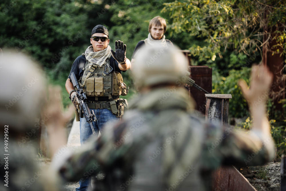 Private Military Contractor inspect the documents on blocked