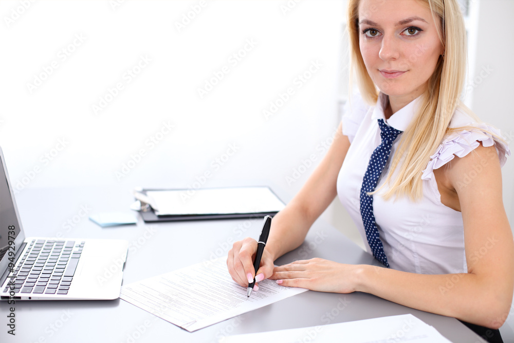 Portrait of business woman secretary in office Portrait of business woman secretary in office