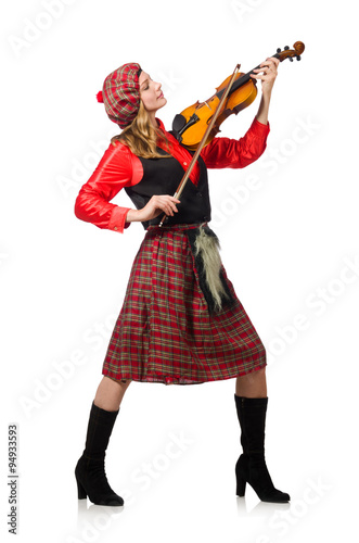 Funny woman in scottish clothing with violin