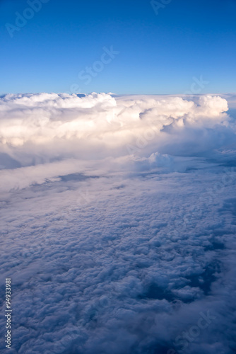 View of the sky and clouds from the airplane porthole