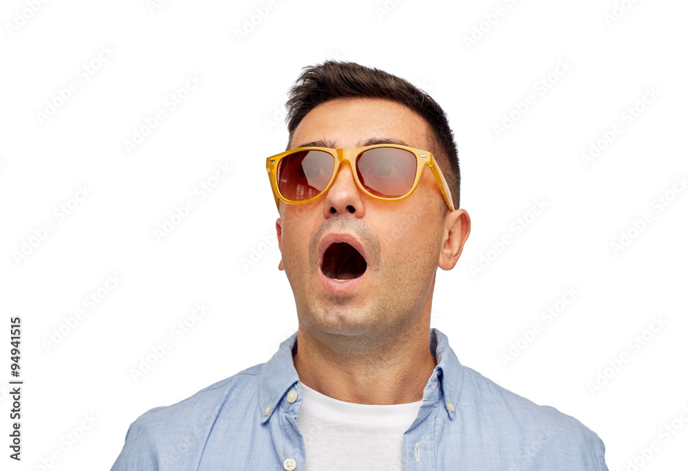 face of scared man in shirt and sunglasses face of scared man in shirt and sunglasses