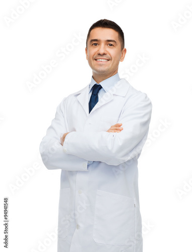 smiling male doctor in white coat