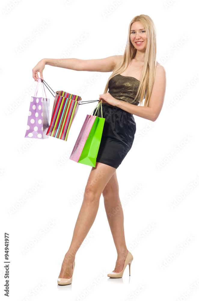 Woman with shopping bags on white