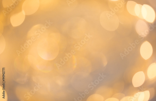 blurred beige holidays lights © Syda Productions