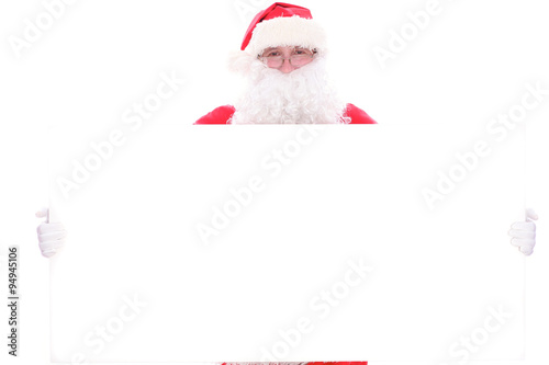 Kind Santa Claus holding copy space area, isolated on white background