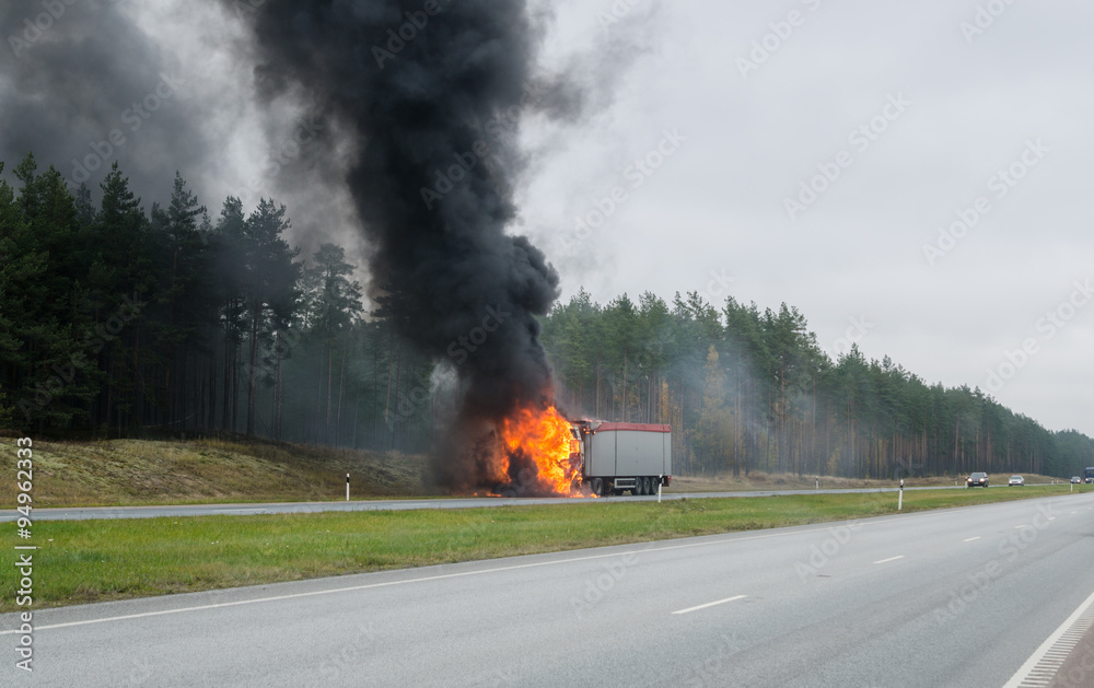 The burning truck on the road