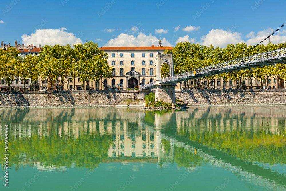Cityscape of Lyon, France with reflections in the water