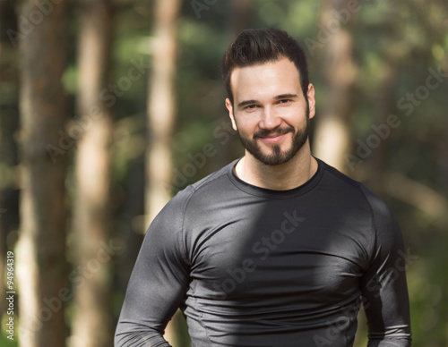 Portrait Of Male Runner in nature after jogging