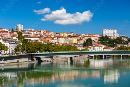 Cityscape of Lyon, France with reflections in the water