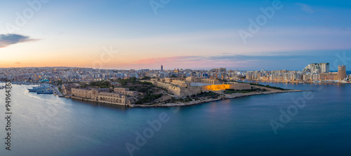 Fototapeta Naklejka Na Ścianę i Meble -  Panoramic view of Malta and Fort Manoel from Valletta at blue hour - Malta