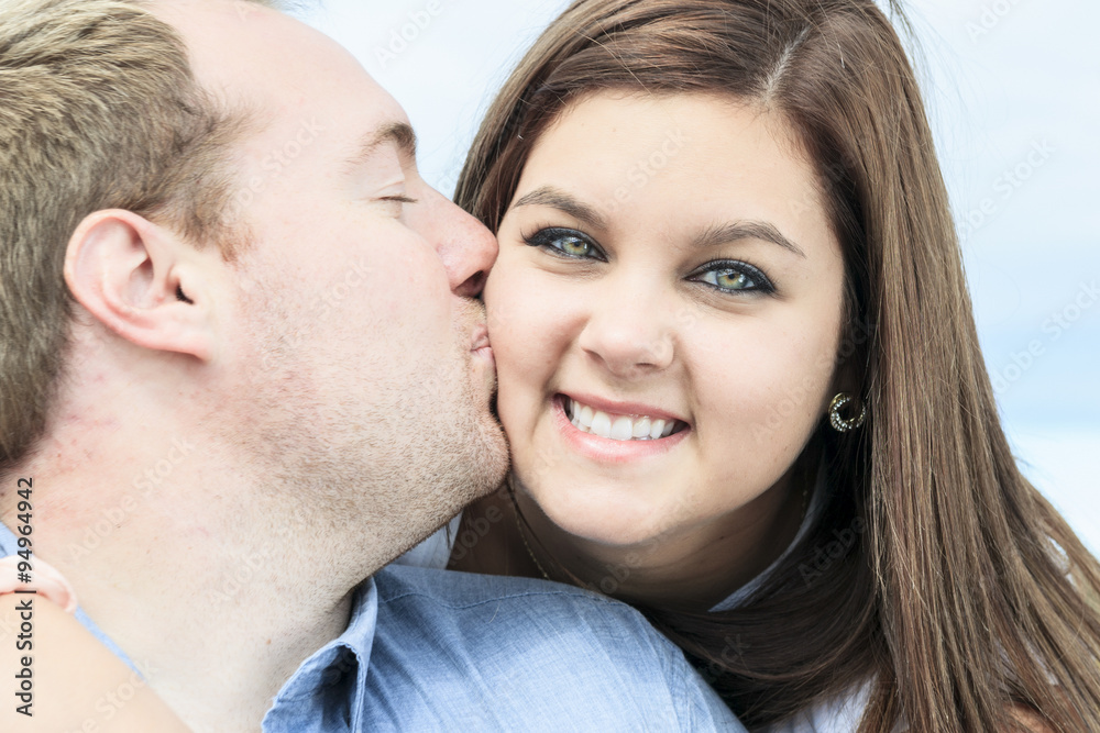 Young happy couple on summer season