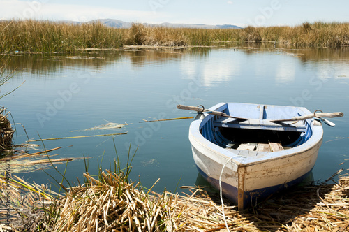 Wooden Boat on Uros Islands - Lake Titicaca - Peru