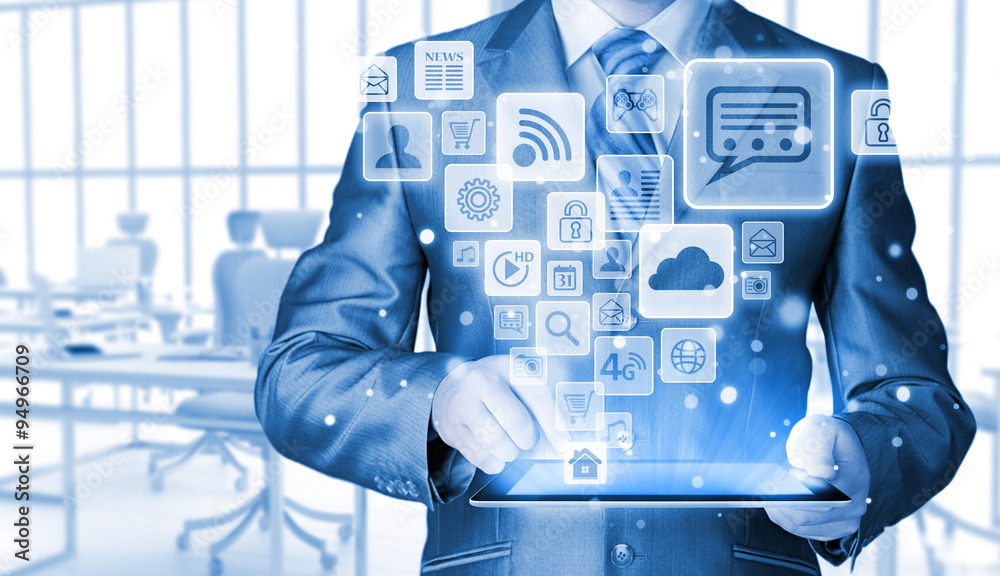 Business man using tablet PC with social media icon set Business man using tablet PC with social media icon set