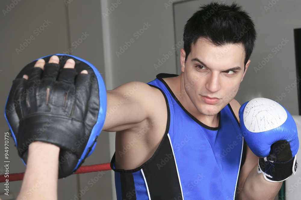 young boxer who training for his fight young boxer who training for his fight