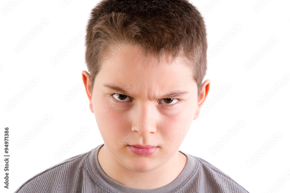Stern Looking Boy with Furrowed Brow Stern Looking Boy with Furrowed Brow