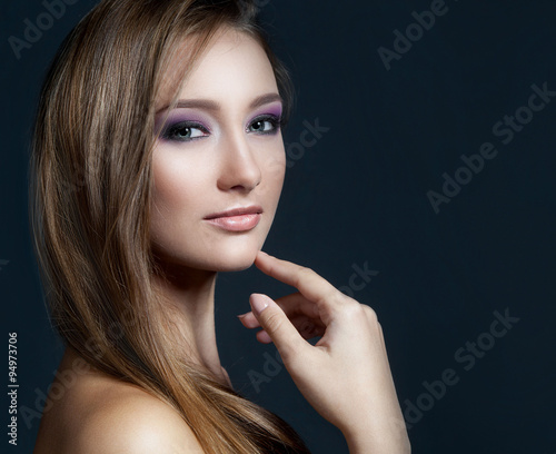 Beautiful sexy woman model with dark evening fashion make-up, br
