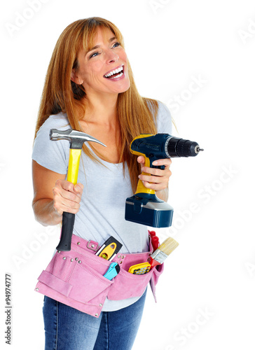 Woman with drill and hammer.