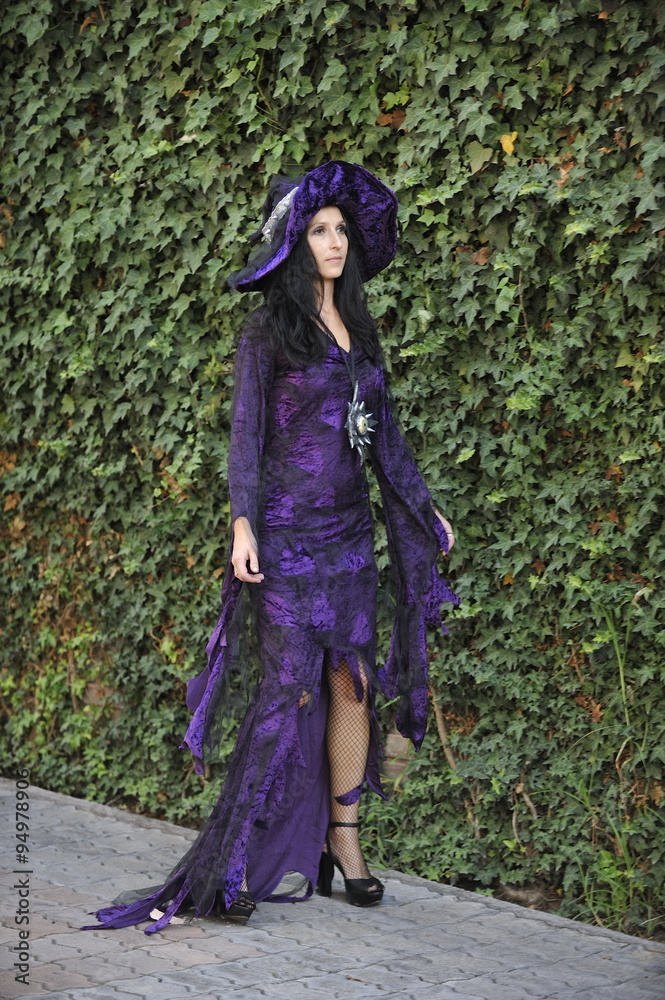 Woman dressed as a witch.
Woman dressed as a witch.