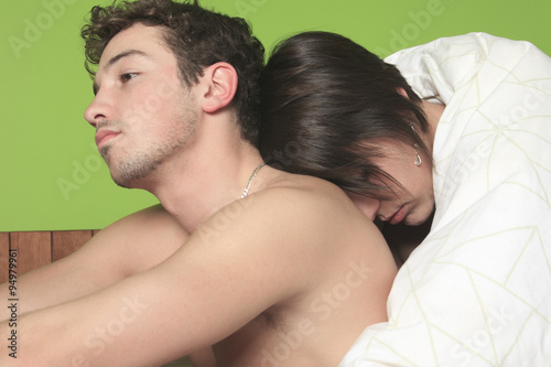 Young couple who having problem in bed