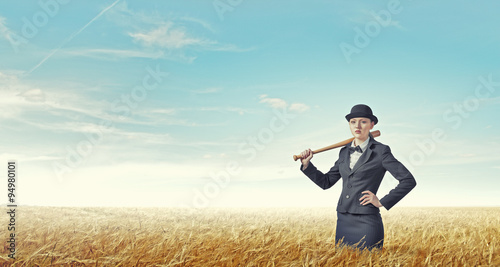 Woman with baseball bat © Sergey Nivens