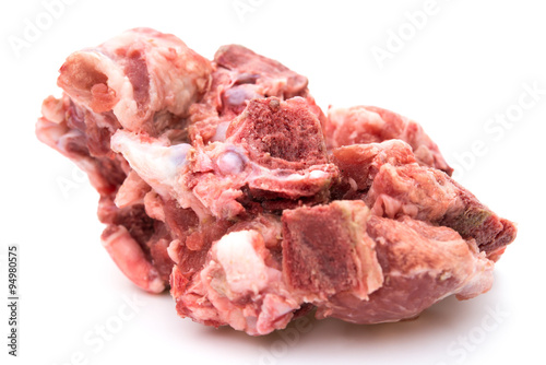 frozen chopped ribs on a white background close up photo