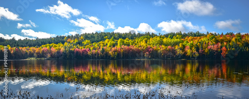 Colorful reflections on the lake in September.