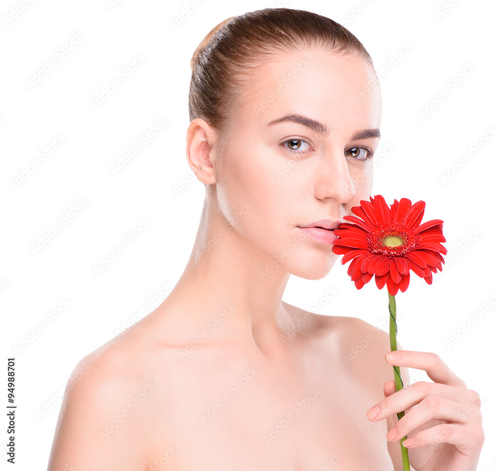 Beautiful woman with red gerbera. Isolated on white background