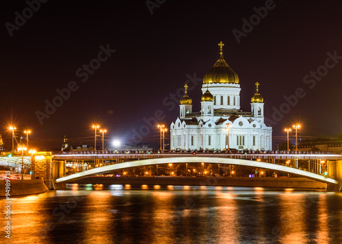 the Cathedral of Christ the Savior and Patriarchal bridge at night, Moscow, Russia.