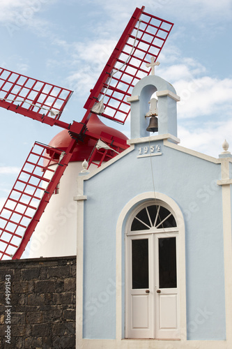 Azores traditional chapel, imperio, and windmill in Sao Miguel. photo