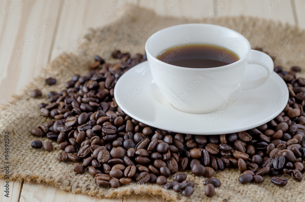 Fototapeta premium Coffee cup and coffee beans