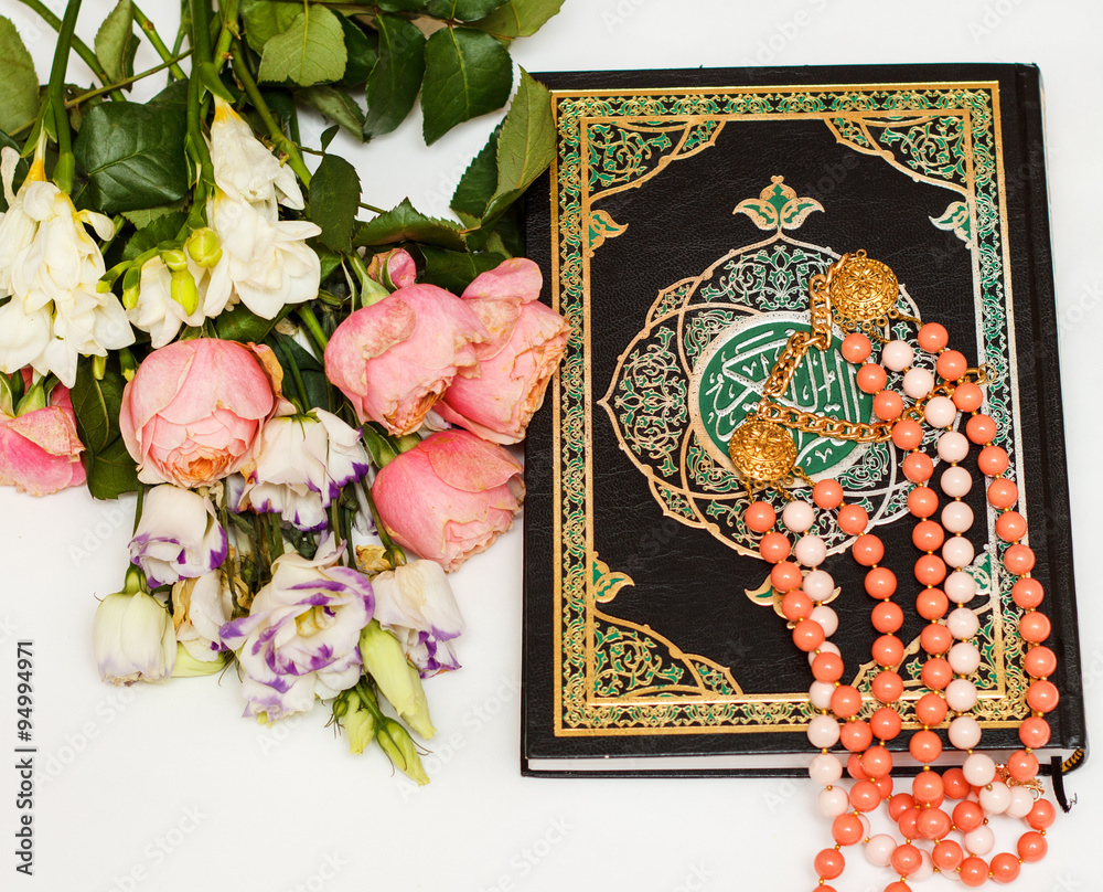 Quran and flowers Stock Photo | Adobe Stock