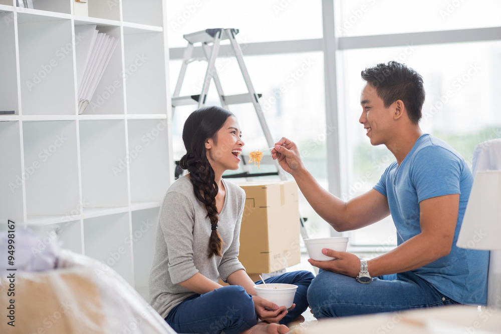 Fototapeta premium Feeding girlfriend