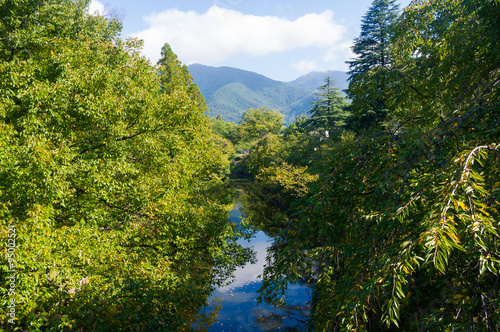 Country Rivers of Japan.It was surrounded by a green tree 
