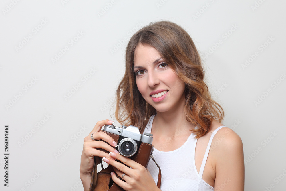 Fototapeta premium young girl with the camera