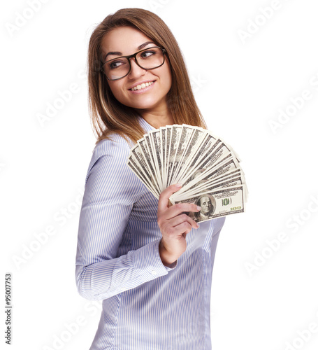 The girl holds a fan of money